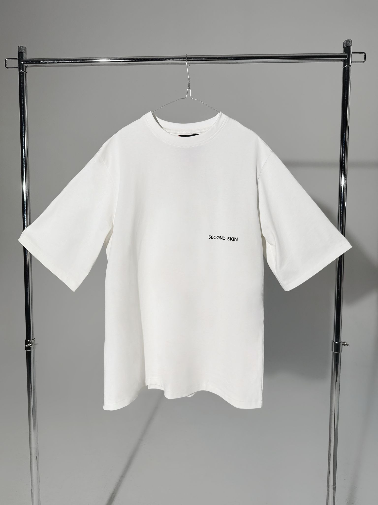 bela oversized napred